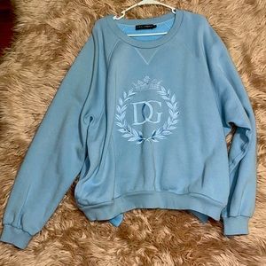 Dolce and Gabbana men’s sweatshirt with pockets and logo with crown baby blue